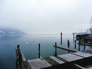 Pier on sea against sky