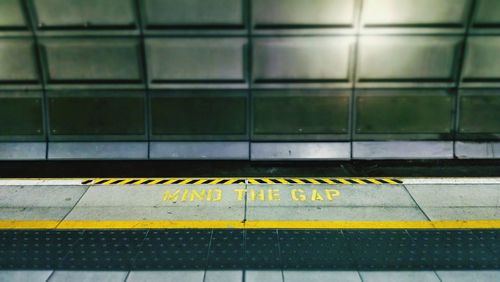 Mind gap sign on subway platform