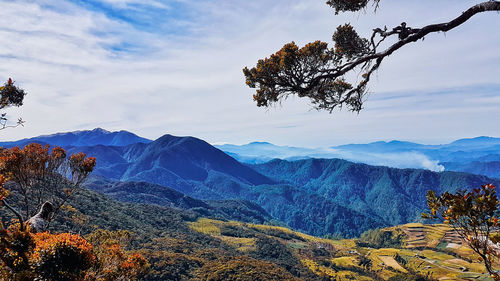 Scenic view of mountains against sky during autumn