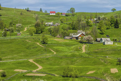 High angle view of houses on field