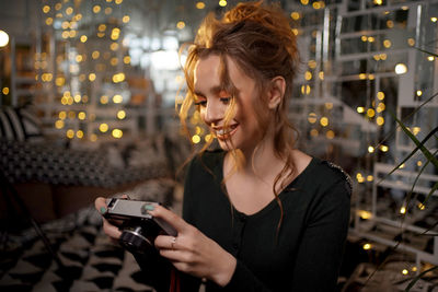 Girl with retro photo camera