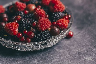 High angle view of fruits in plate on table