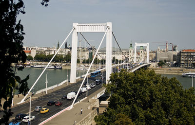 High angle view of suspension bridge in city