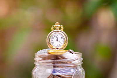 Close-up of glass jar on table