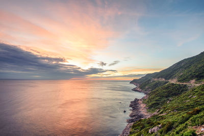 Scenic view of sea against sky during sunset