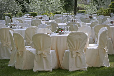 View of chairs in field