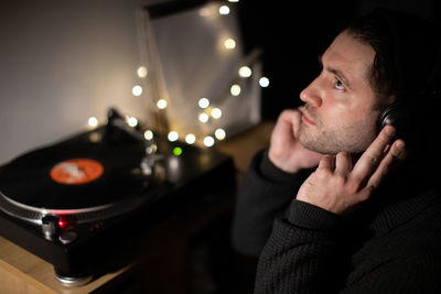 Portrait of young man at music concert