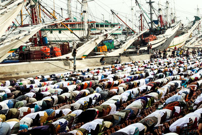 Muslims in jakarta, indonesia gathering together to perform eid prayers to celebrate idul fitri.
