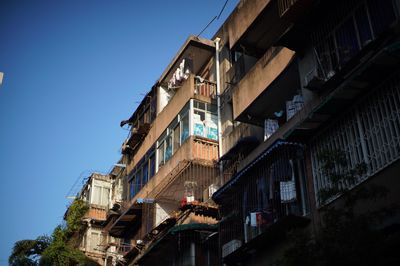 Low angle view of residential building against sky