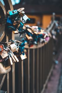 Close-up of padlocks on railing