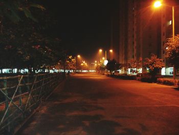 Illuminated street lights at night