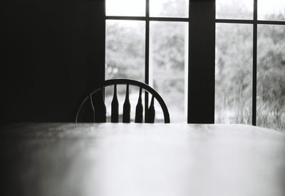 Close-up of empty chair on table at home