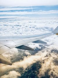 Cropped image of airplane wing