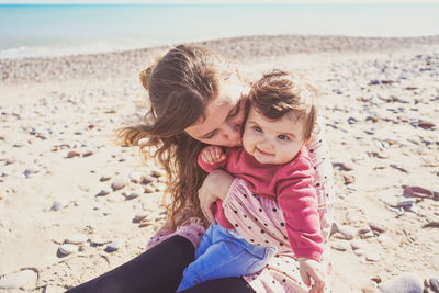 Mother and daughter at beach