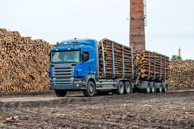 Semi truck transporting logs