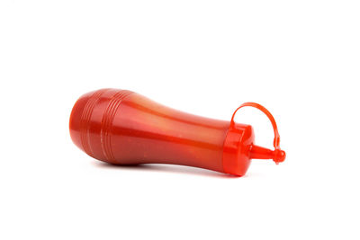 High angle view of red toy on white background
