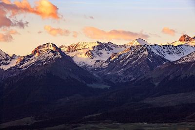 Scenic view of mountains against sky during sunset