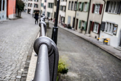 Close-up of motorcycle on city street