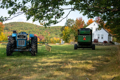 Tractor on field against sky