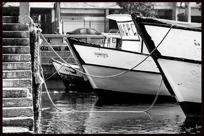 Close-up of boats in water