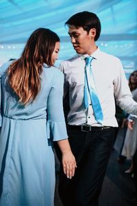 Young couple standing outdoors