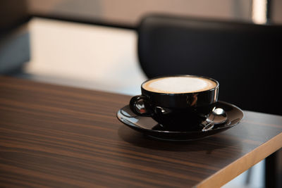 Coffee cup on table