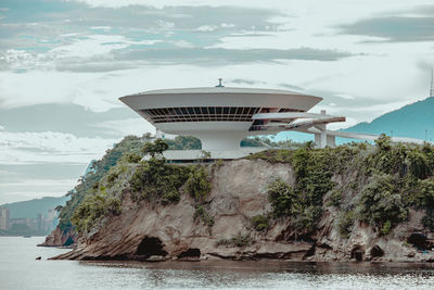 Scenic view of sea against cloudy sky