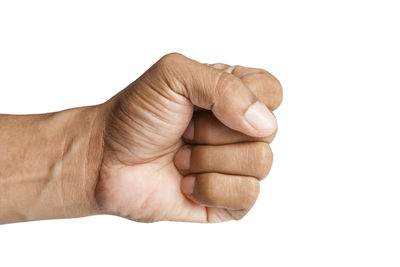 Close-up of hand against white background