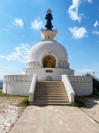 Low angle view of a buddhist temple of peace  against sky in comiso