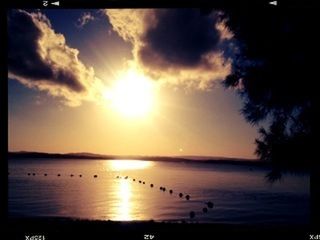 transfer print, sunset, water, sun, scenics, tranquil scene, beauty in nature, sea, auto post production filter, sky, tranquility, reflection, silhouette, nature, idyllic, beach, sunlight, cloud - sky, horizon over water, orange color