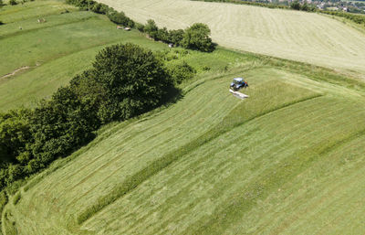 High angle view of golf course on grassy field