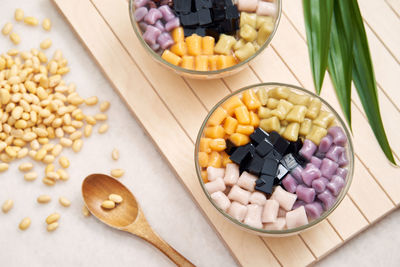 High angle view of candies in bowl on table