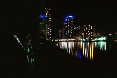 Illuminated buildings in city at night