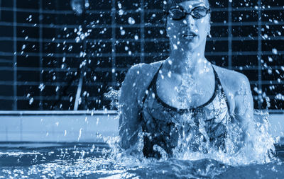 Low angle view of water splashing in swimming pool