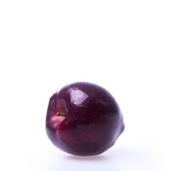 Close-up of apple against white background