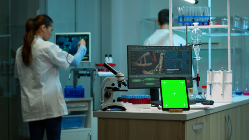 Female doctor working in laboratory