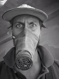 Close-up portrait of mid adult man