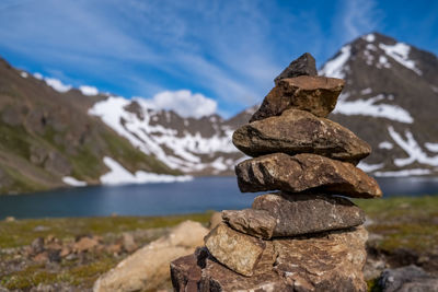 Stack of rocks against sky