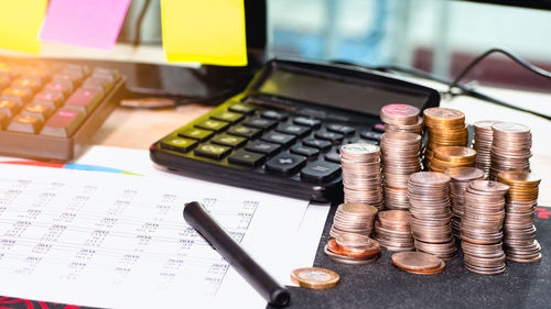 Close-up of coins on table