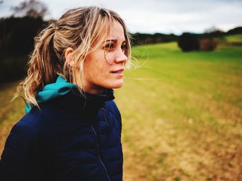 Portrait of woman on field