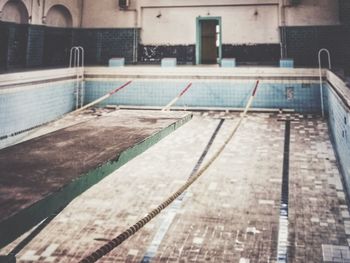 High angle view of swimming pool by building
