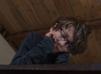 Portrait of cute boy looking away