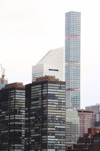 Low angle view of modern buildings against clear sky