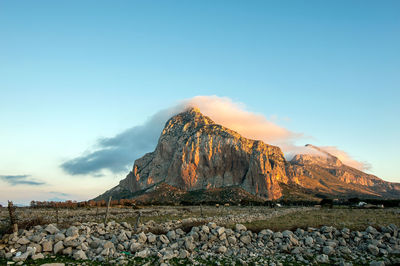 Panoramic view of rock formations against sky