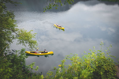 People in kayak at lake