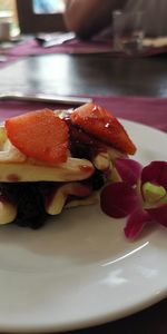 Close-up of strawberries in plate on table