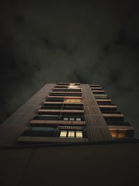 Low angle view of building against sky at dusk