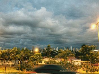 View of city against cloudy sky