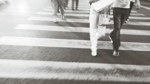 Woman walking on road