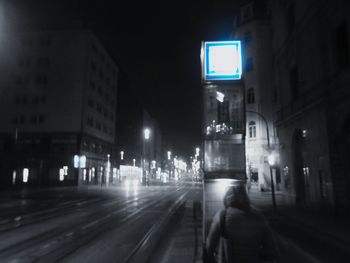 Illuminated street at night